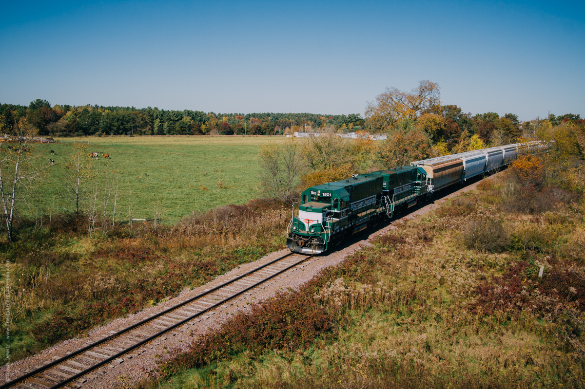 The almost daily Wisconsin Northern train heads south out of Cameron, Wisconsin to Norma. These tracks use to be a part of the Chicago and North Western's route between Eau Claire and Superior.