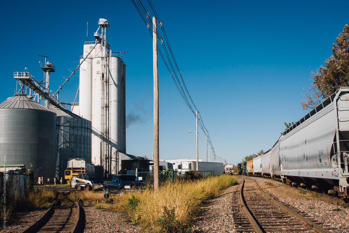 The Wisconsin Northen is spotting a string of hoppers of soy meal and/or corn  used by the Jennie-O Turkey Store in Barron, Wisconsin. The soy meal and corn are used for turkey feed. Jennie-O is a wholly owned subsidiary of Hormel Foods Corporation. This plant is the only Jennie-O plant not located in Minnesota. It has been a part of the Barron community since 1922 and is now one of the most state of the art turkey processing facilities in the United States. It is also the largest employers in Barron County.